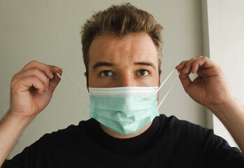 Young man wearing a mask 