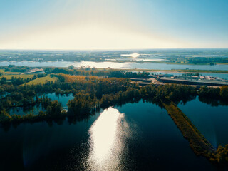 Aerial drone view of the watery landscape near the Waal river in the Netherlands.