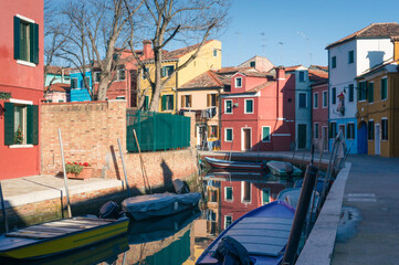 Fototapeta na wymiar Boats on the canal on the island of Burano