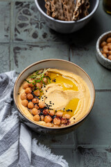 Traditional homemade chickpea hummus with olive oil