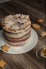 Chef or baker decorating cake with white whipped cream.Soft fokus