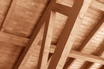 Wooden roof structure for a house, wooden house construction.