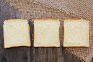 Square slices of white toast bread