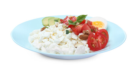 Plate of fresh cottage cheese with vegetables and egg isolated on white