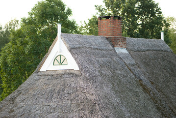 Idyllic farmhouse with a reed roof near Hamburg. Germany, Europe
