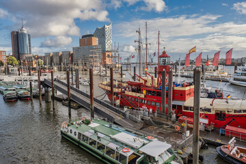 Scenery with promenade and tourbats from Hamburg harbor, Germany