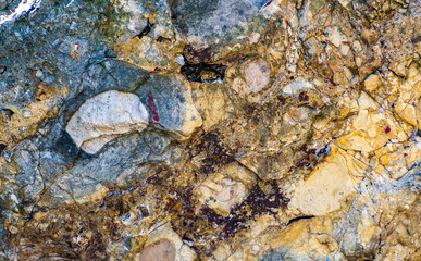 Rough broken stone rock background texture sharp edges