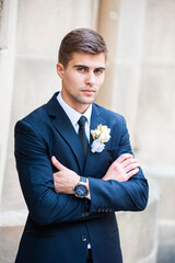 Fashion groom portrait. Wedding day