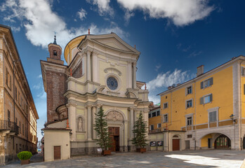Fototapeta na wymiar Cuneo, Piedmont, Italy - October 6, 2021: Church of St Ambrose (1743 Francesco Gallo project) in Via Roma