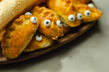 Mini pasties with decorating eyes, succulent pork, turkey, bacon and cranberry all wrapped in shortcrust pastry