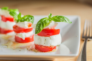Caprese salad with mozarella cheese,tomatoes and basil.creative option