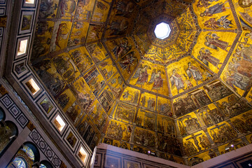 Fototapeta na wymiar Beauiful golden ceiling at the Baptisterium of Florence part of the Florence Cathedral (Cattedrale di Santa Maria del Fiore), Italy