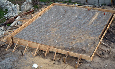 Timber formwork with metal reinforcement for pouring concrete and creating a solid foundation for a...