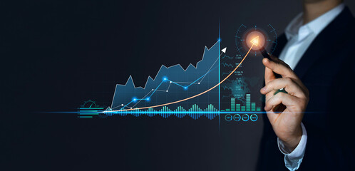 Analyzing and data exchange. Businessman with  pen draws growth graph of business. Business...