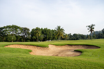 Golf course sandpit background, sandpits are used as obstacles for competitions and the beauty of the course - obrazy, fototapety, plakaty