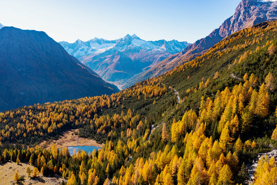 autumn aerial view of the Entova lake in Valmalenco, Italy