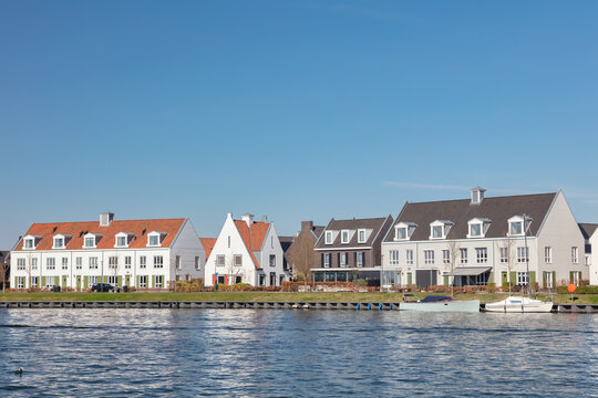 Rows of family homes located on the Veluwemeer waterfront in Harderwijk, The Netherlands