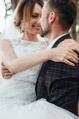 walk of the bride and groom through the autumn forest