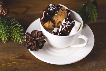 Beautiful Christmas Food Background Cookies with Chocolate in White Cup on Wooden Background Christmas Dessert Horizontal