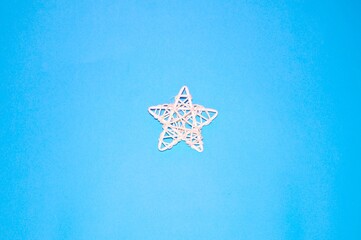 The layout of the new year, Christmas - a star lies on a blue background.