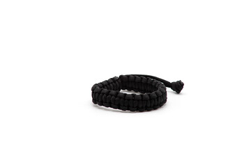 Isolated photos of a military-style braided paracord bracelet