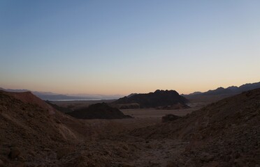 Hiking in evening in Shehoret mountains, south Israel, sunset time