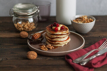 classic American Canadian breakfast pancakes with honey