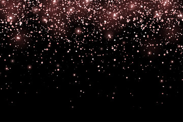 Obraz premium Rose gold glitter shiny holiday confetti with glow lights on black background. Vector