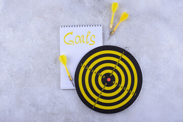 Target and goal concept with darts and arrows