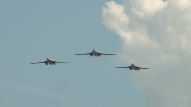 Tupolev Tu-160M ​​(NATO codification: Blackjack). Close-up. Flight of three supersonic strategic bomber Tu-160M ​​with variable wingspan. Zhukovsky, Russia, August 10, 2012 
