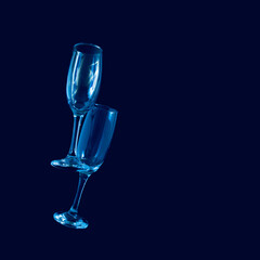 two glasses of champagne with neon blue lights. modern futurism 2022 year background. minimalism. surrealism. creative decoration idea with copyspace