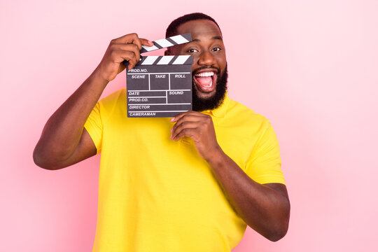Photo Of Afro American Brown Haired Stylish Trendy Man Wear Yellow T-shirt Film Director Isolated On Pink Color Background