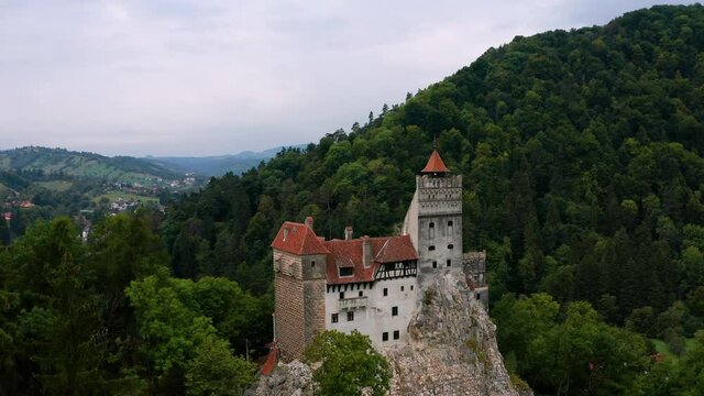 Aerial view of Bran Castle at sunset. Dracula's castle in Transylvania, Romania