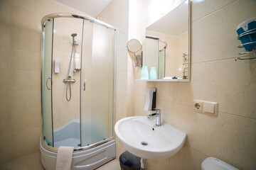 Classic typical bathroom in light interior