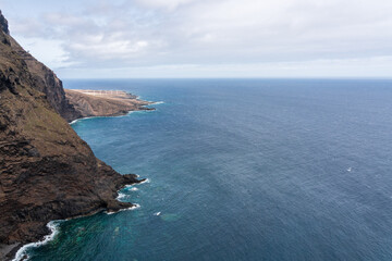 Fototapeta na wymiar Rocky coast of the Atlantic Ocean. View from the observation deck - Mirador Punta del Fraile. Tenerife. Canary Islands. Spain.