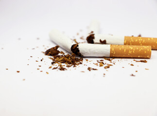 Stop smoking concept. Half and Half broken cigarette isolated on white background, Close up image of broken cigarette, World No Tobacco Day concept.