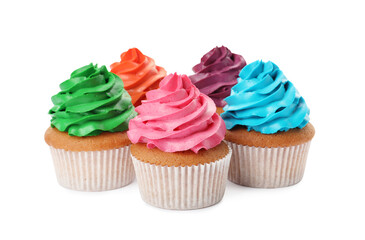 Different delicious colorful cupcakes on white background