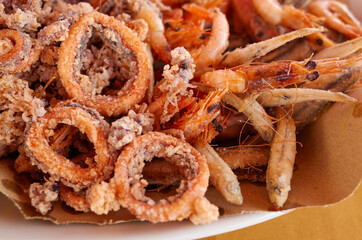 Assorted fried fish close up