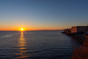 sunset on the sea promenade in Genoa Nervi in Liguria