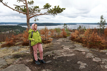 Woman standing on Mount Hiidenvuori