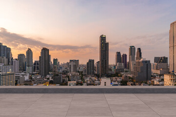 Panoramic Bangkok skyline view, concrete observatory deck on rooftop, sunset. Luxury Asian corporate and residential lifestyle. Financial city downtown, real estate. Product display mockup empty roof