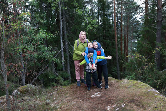Mother and son at foot of Mount Hiidenvuori