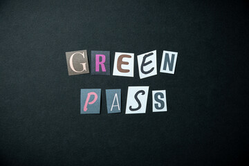 Green pass words. Caption, heading made of letters with different fonts on a dark background.