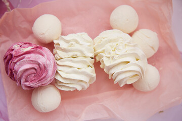 Winter aesthetic. Healthy natural delicate pink and white marshmallow close up. Top view. Cozy winter weekends. Homemade sweets