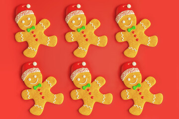 Traditional gingerbread man with icing Christmas new year cookies, flat lay pattern on red background