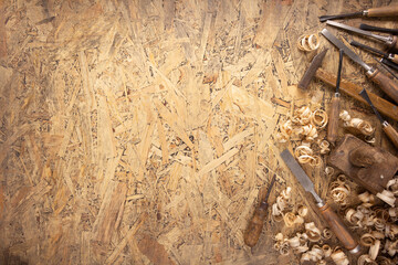 Plane jointer carpenter or joiner tool and wood shavings. Woodworking tools  wooden table