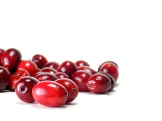 Ripe cranberries on a white background. Selective focus.