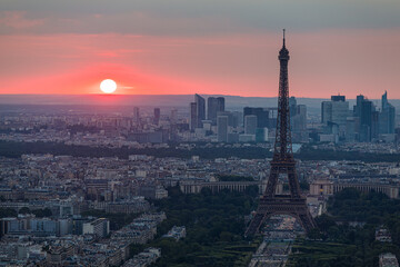 Fototapeta na wymiar Panoramic aerial view of Paris, Eiffel Tower and La Defense business district. Aerial view of Paris at sunset. Panoramic view of Paris skyline with Eiffel Tower and La Defense. Paris, France.