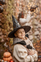 Children celebrate Halloween in outdoor decorations