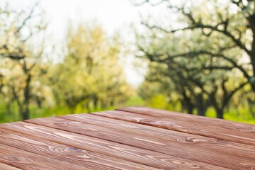 Empty brown wooden table with free space